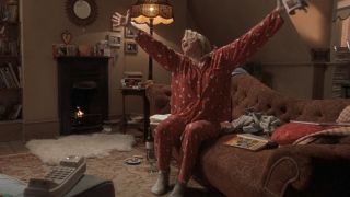 Bridget singing in her red pajamas in Bridget Jones's Diary