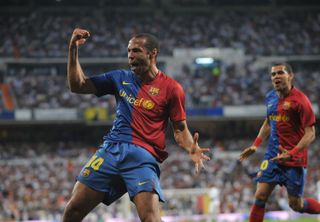 Thierry Henry celebrates after scoring for Barcelona against Real Madrid in 2009.