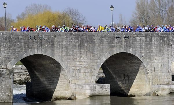The peloton crosses a bridge en route to the stage two finish in Limoges.