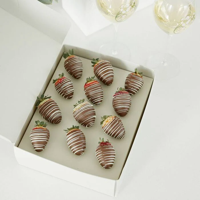 White cardboard box of chocolate covered strawberries