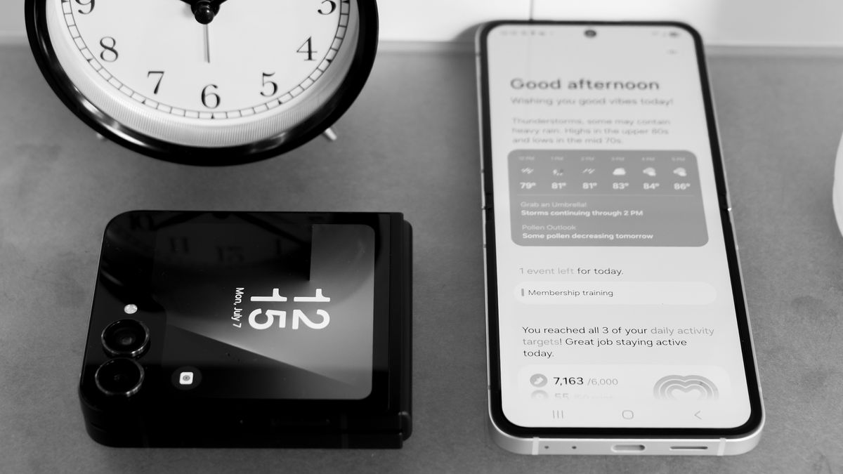 Samsung Galaxy Z Flip 7 FE in black closed with time on the cover display and open with the Now Brief screen showing