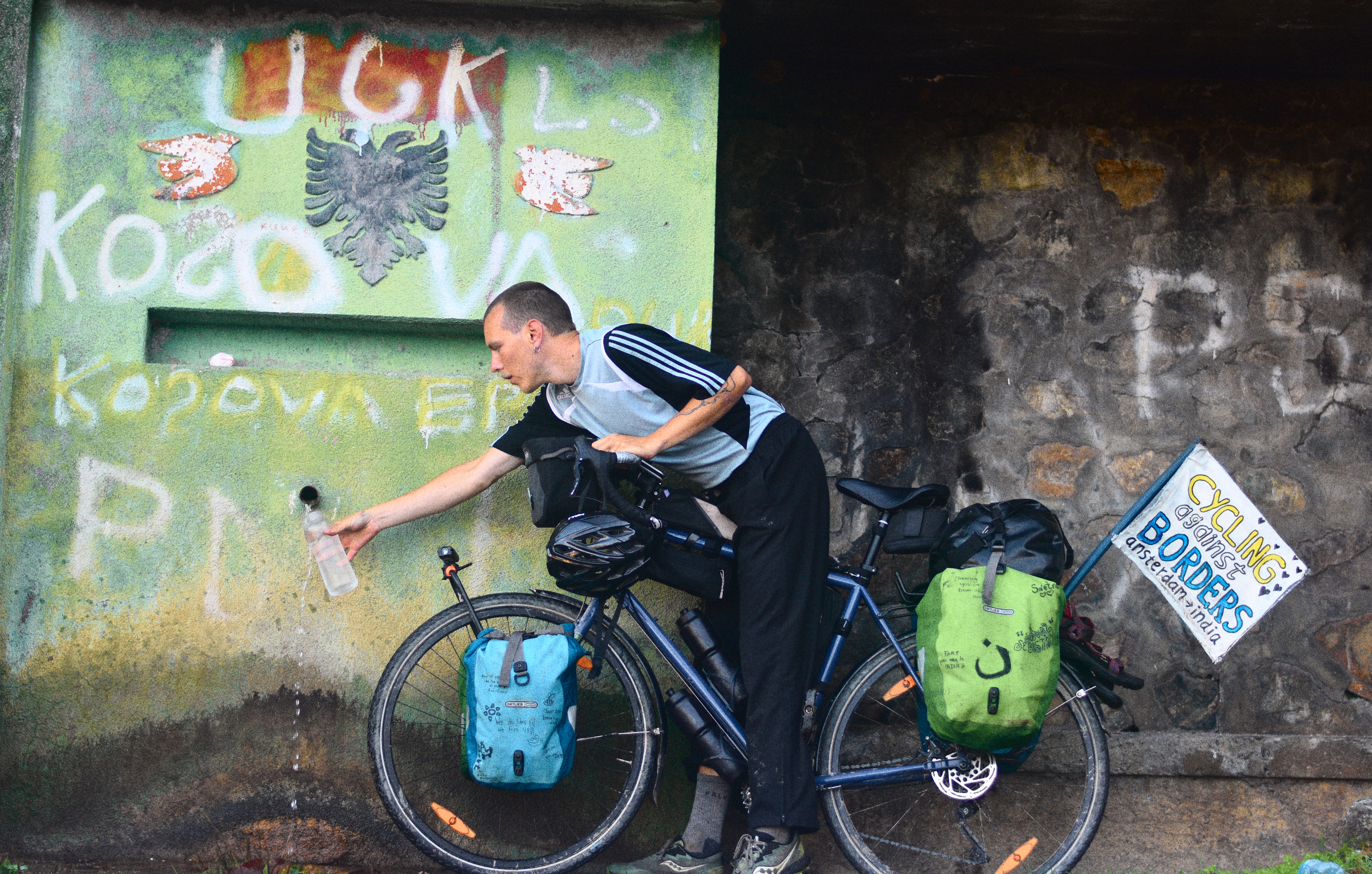 Seb gets water from a tap