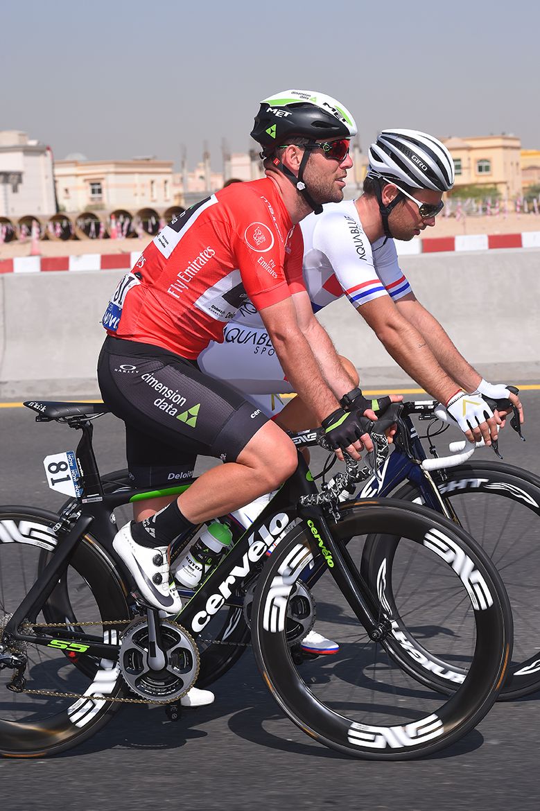 Mark Cavendish wears the red jersey