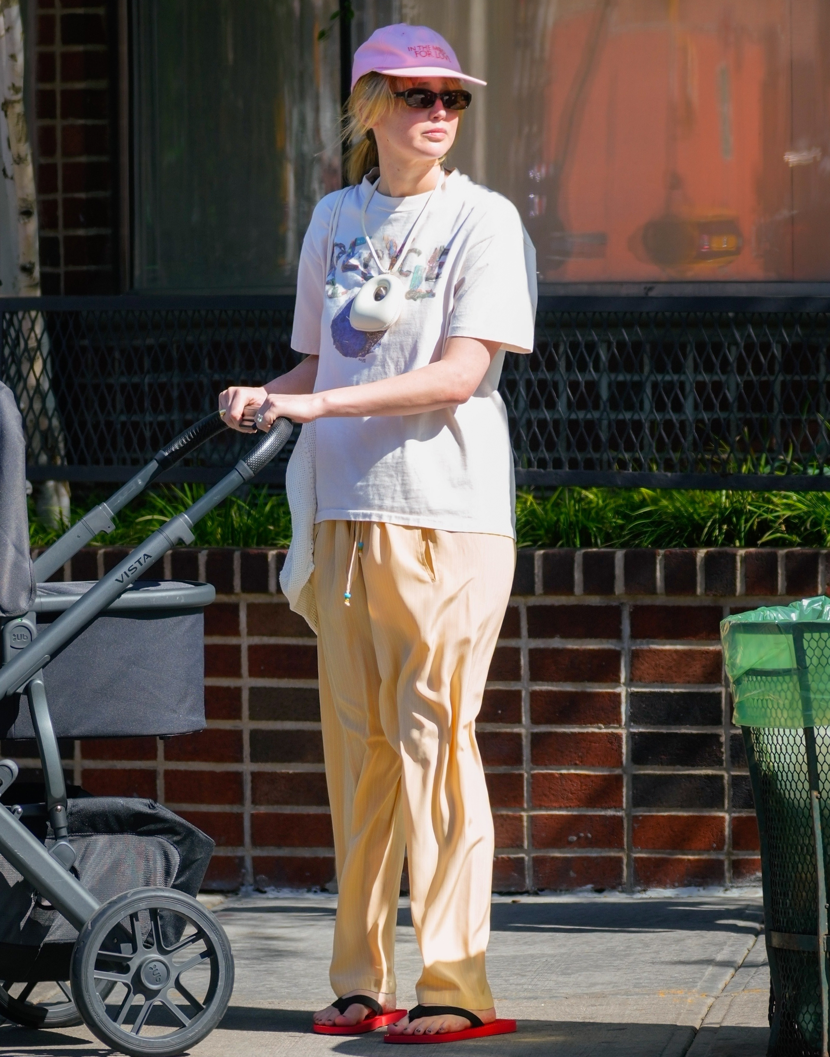 Jennifer Lawrence wearing The Row flip flops