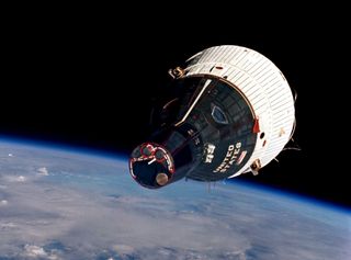 A view of the Gemini 7 spacecraft in orbit, as seen from Gemini 6 before the two capsules docked in 1965.