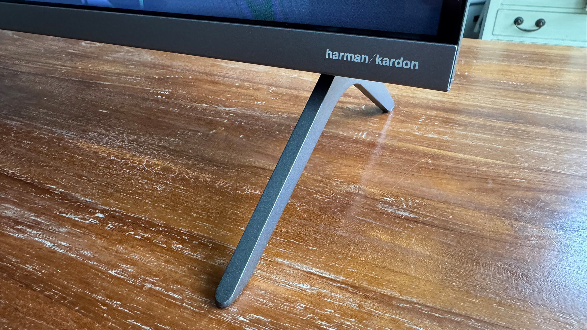 Sharp GM6245K 43-inch TV detail of corner of set showing Harman Kardon logo