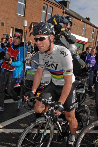 Stage 3 winner Mark Cavendish (Sky) heads to the podium in Dumfries.