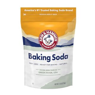 A yellow and blue bag of Arm & Hammer Baking Soda with red logo