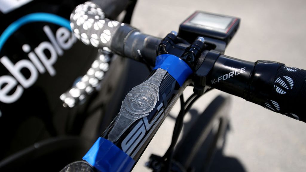 A close look at the medallion atop Piccoli's stem. Read below to find out the story behind it.