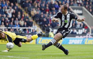 Alan Shearer of Newcastle scores past Carlo Nash of Manchester City during the FA Barclaycard Premiership game between Newcastle United and Manchester City on January 18, 2003 at St James Park, Newcastle.