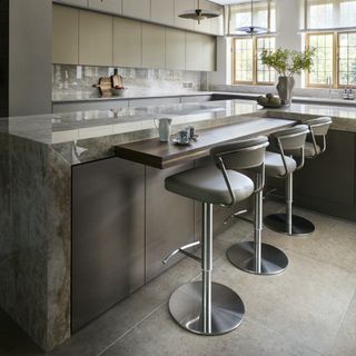kitchen with island and stools