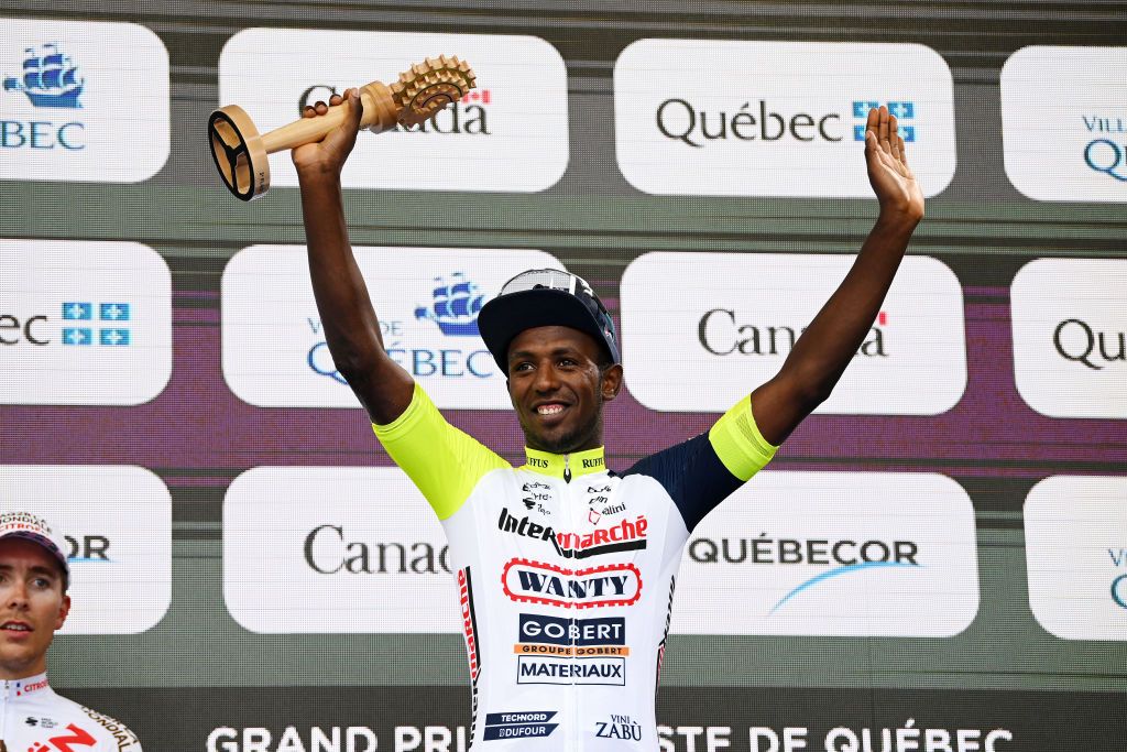 QUEBEC CITY QUEBEC SEPTEMBER 09 Hailu Biniam Girmay of Eritrea and Team Intermarch Wanty Gobert Matriaux celebrates winning the third place on the podium ceremony after the 11th Grand Prix Cycliste de Qubec 2022 a 2016km one day race from Quebec to Quebec GPCQM on September 09 2022 in Quebec City Quebec Photo by Dario BelingheriGetty Images