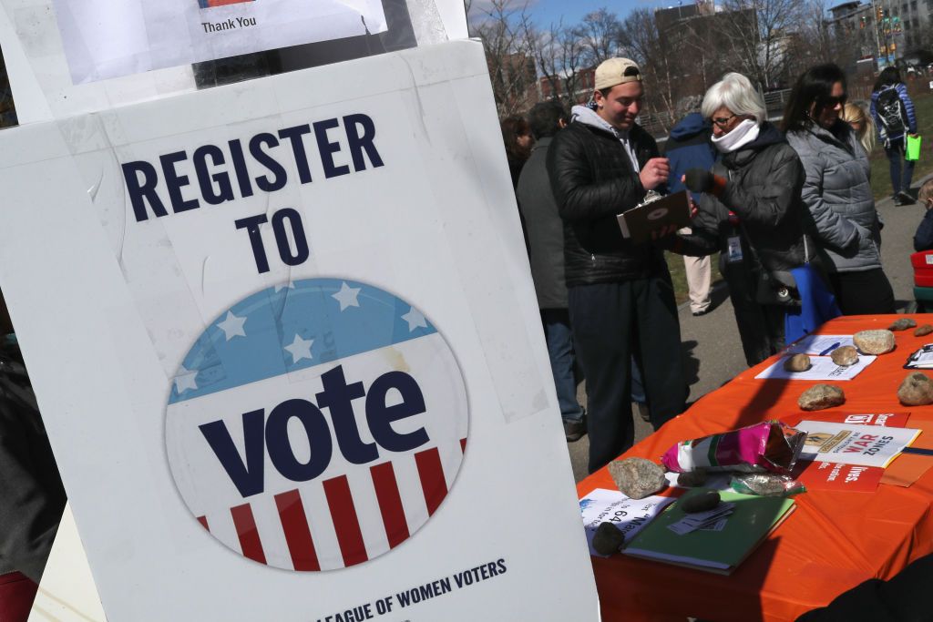 People register to vote.