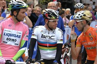 Ivan Basso, Cadel Evans and Samuel Sanchez await the start.