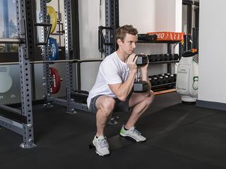 Fitness expert Jamie Greaves performing a squat