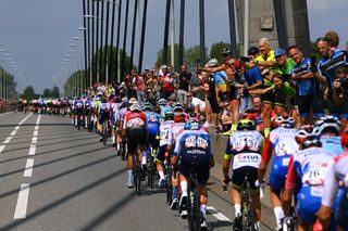 UTRECHT NETHERLANDS AUGUST 20 A general view of the peloton passing across a bridge landscape during the 77th Tour of Spain 2022 Stage 2 a 1751km stage from sHertogenbosch to Utrecht LaVuelta22 WorldTour on August 20 2022 in Utrecht Netherlands Photo by Tim de WaeleGetty Images