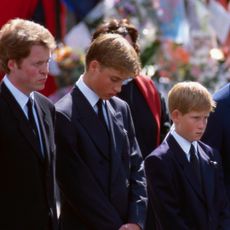 Earl Charles Spencer, the younger brother of Princess Diana, stands with Prince William, Prince Harry, and Prince Charles at the funeral of Diana, Princess of Wales, only seven days after she was killed in an automobile accident in Paris.