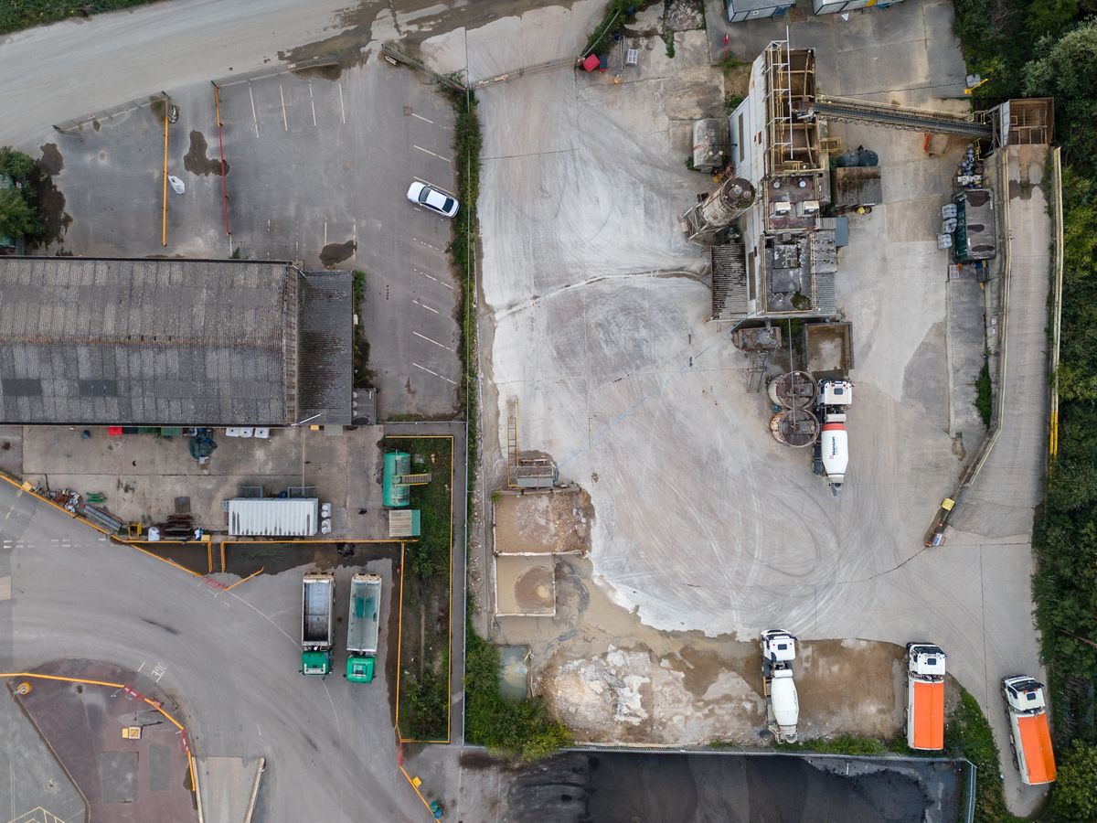 Image taken by DJI Air 3 (a camera drone). Here we see a direct overhead view of an industrial yard.