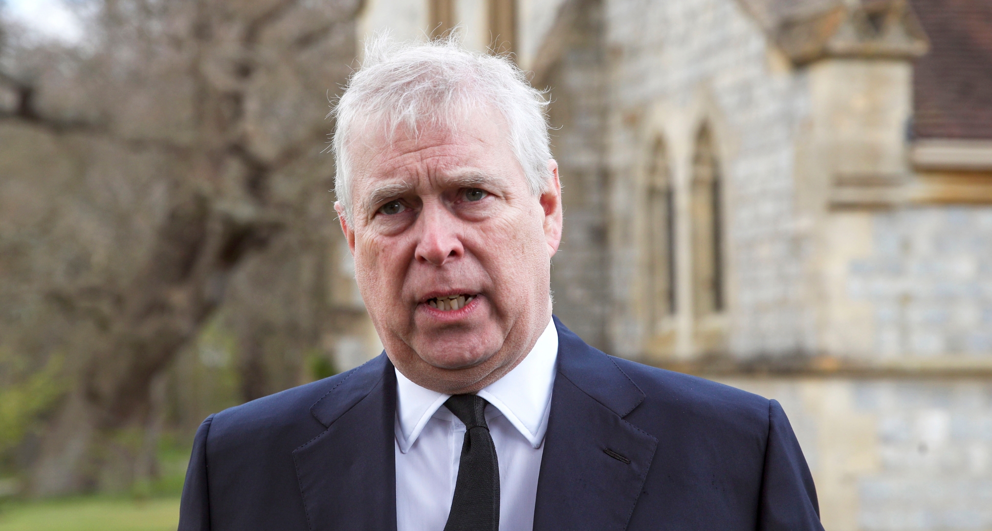 Prince Andrew standing outside the Chapel of All Saints at Royal Lodge