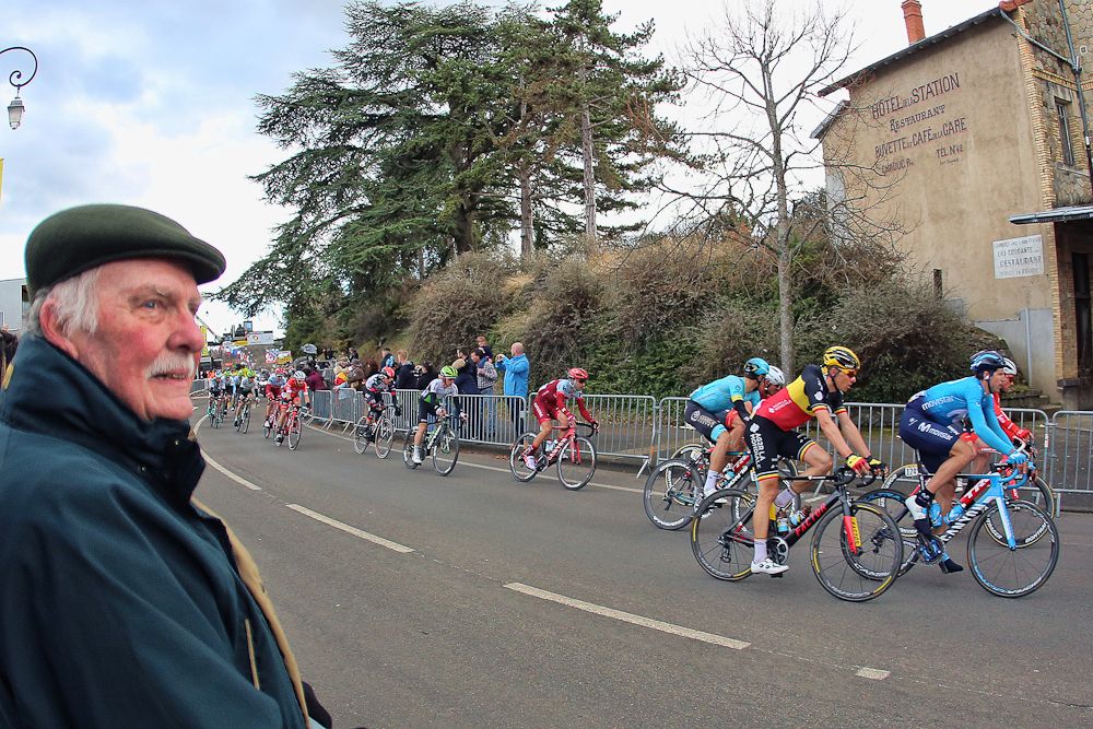 A spectator takes in the peloton at Paris-Nice