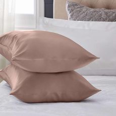 rose silk pillowcase with white bedsheet
