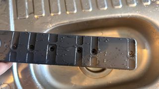 how to remove a dishwasher filter - writer cleaning dishwasher spinner in sink