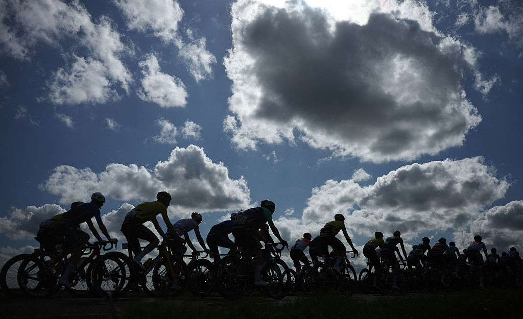 The pack rides during the 2nd stage of the Paris-Nice cycling race, 187 km between &amp;Eacute;p&amp;ocirc;ne and Montargis, on March 9, 2026. (Photo by Anne-Christine POUJOULAT / AFP)