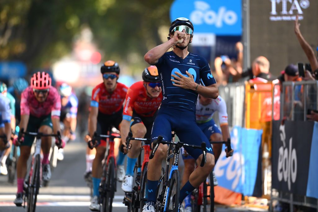 BEINASCO ITALY OCTOBER 06 Ivan Garcia Cortina of Spain and Movistar Team celebrates at finish line as race winner ahead of Matej Mohoric of Slovenia and Team Bahrain Victorious during the 106th Gran Piemonte 2022 a 198km one day race from Omegna to Beinasco GranPiemonte on October 06 2022 in Beinasco Italy Photo by Tim de WaeleGetty Images