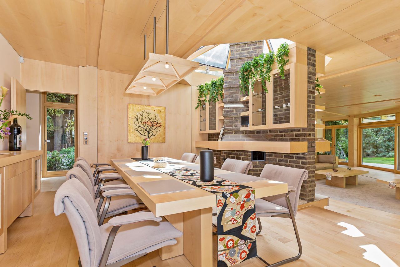 The dining table in the zig zag house as seen from a different angle
