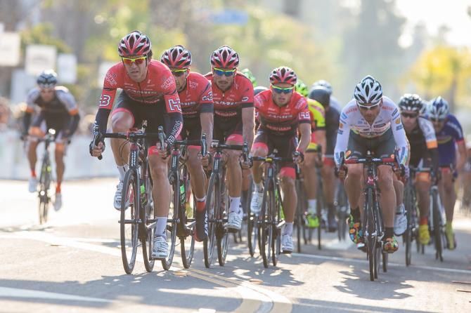 Team Jamis- Hagens Berman p/b Sutter Home lends a hand in the closing laps to bring back the break.