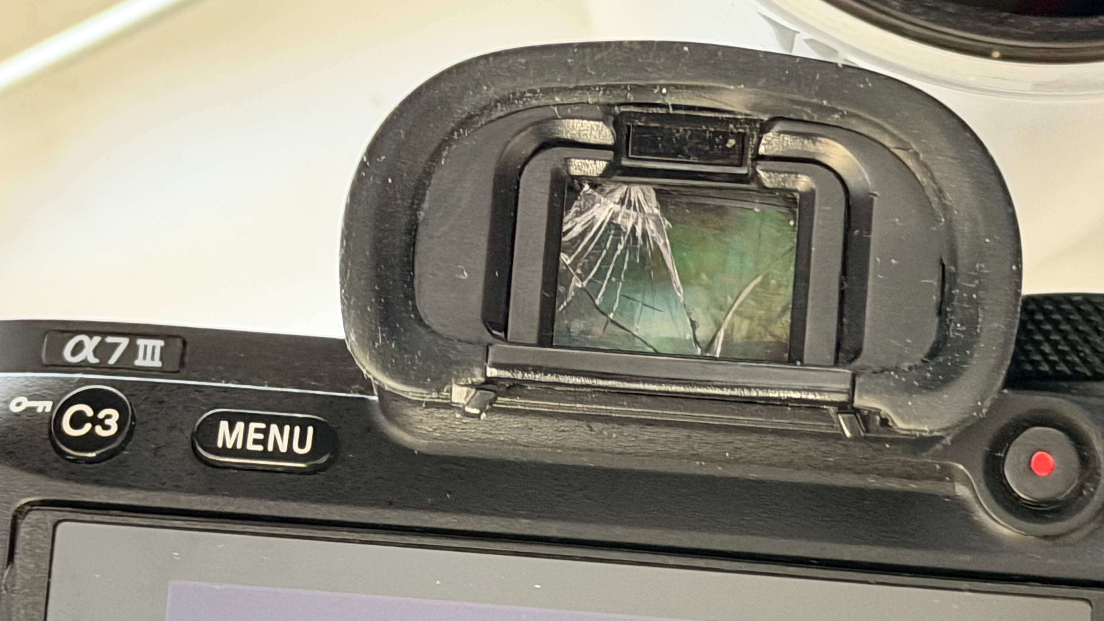 Damaged Sony a7iii camera with cracked glass in way of EVF