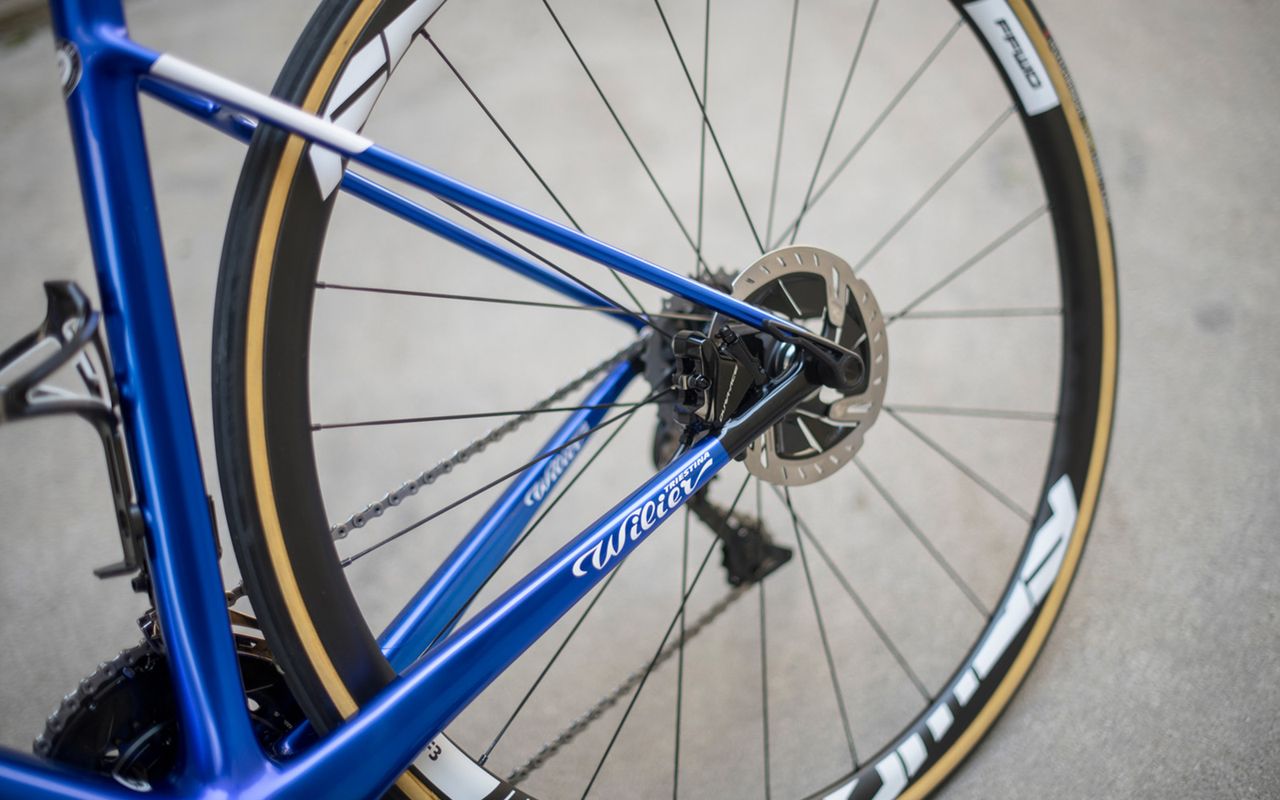The bike features Shimano Dura-Ace disc brakes front and rear