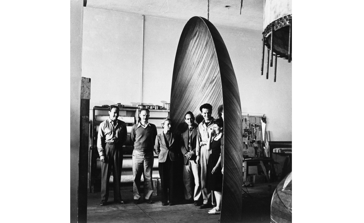 The exhibition opens with a large-scale plywood sculpture
