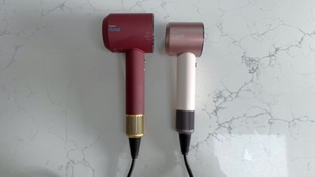 Dyson Supersonic Nural and Dyson Supersonic Travel hair dryers shown side by side