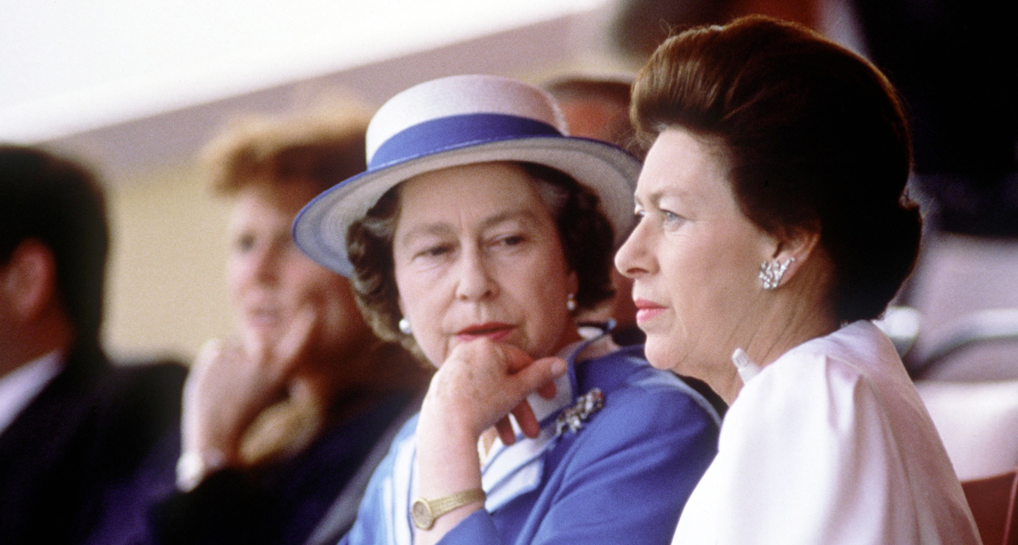 Queen Elizabeth sitting next to Princess Margaret