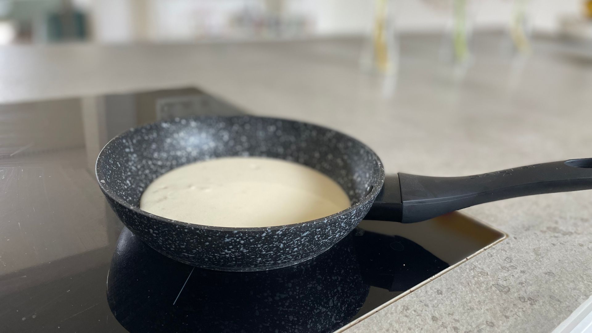 Raw pancake mix in the Salter Megastone Frying Pan Set