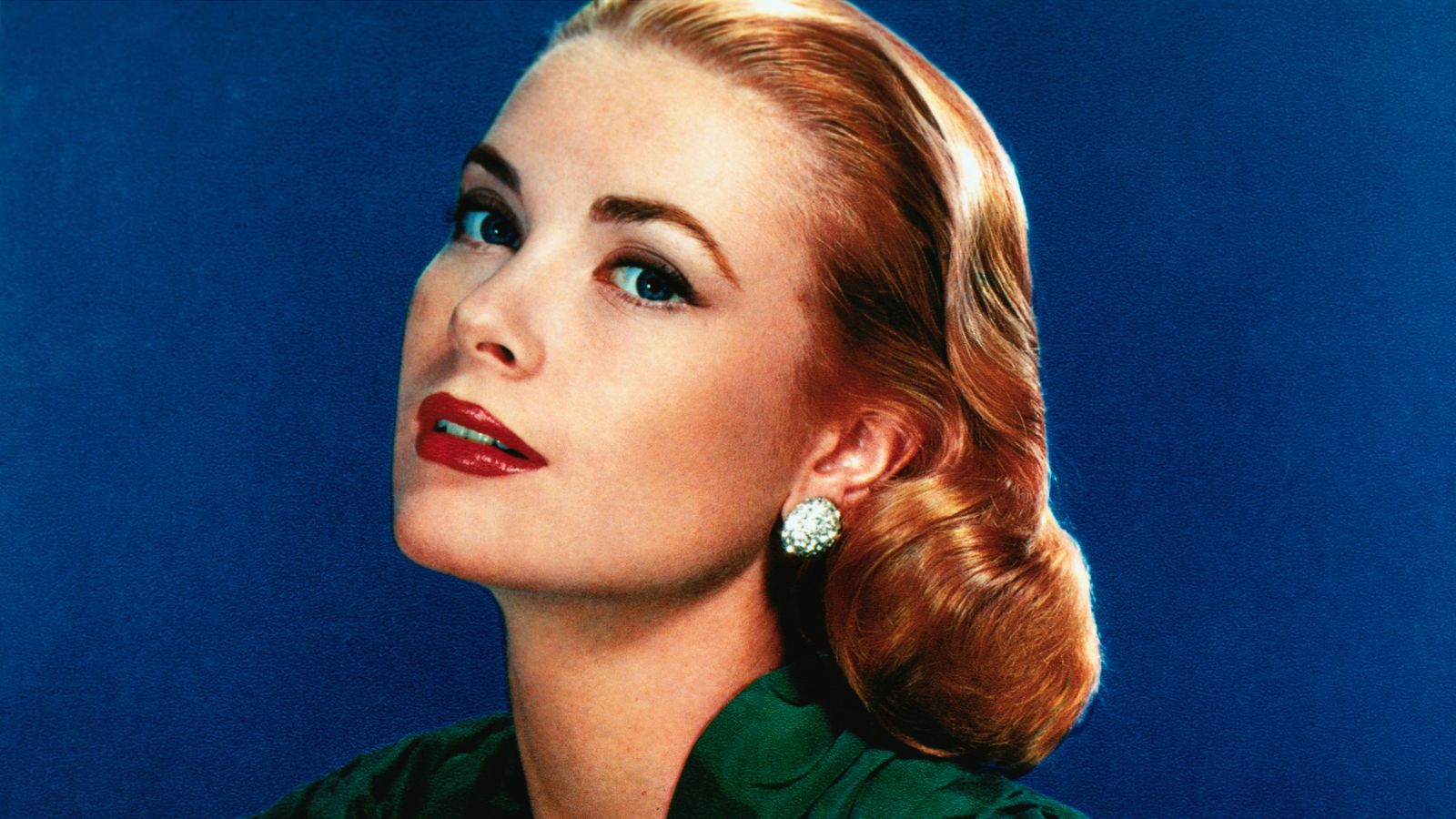 grace kelly on a navy blue background