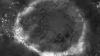 A balck and white photo of the northern hemisphere showing where auroras were located during May 11