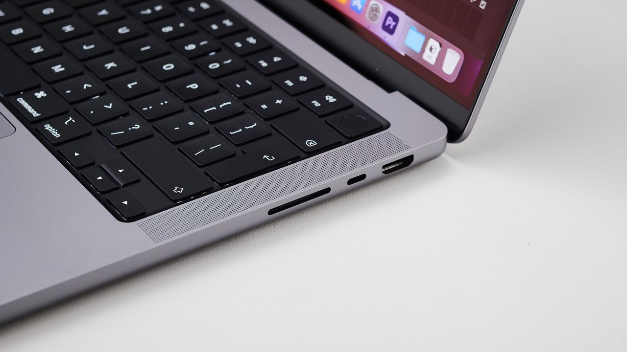 MacBook Pro 14-inch on a table in an office