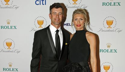 Scott with his wife at the Presidents Cup