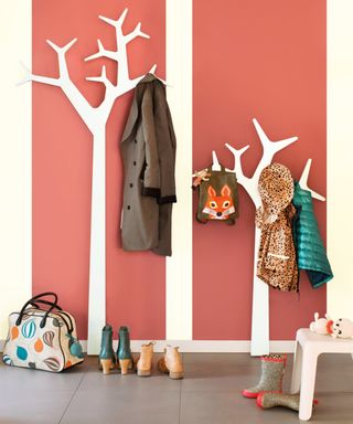 Coral and white modern hallway with coat stand