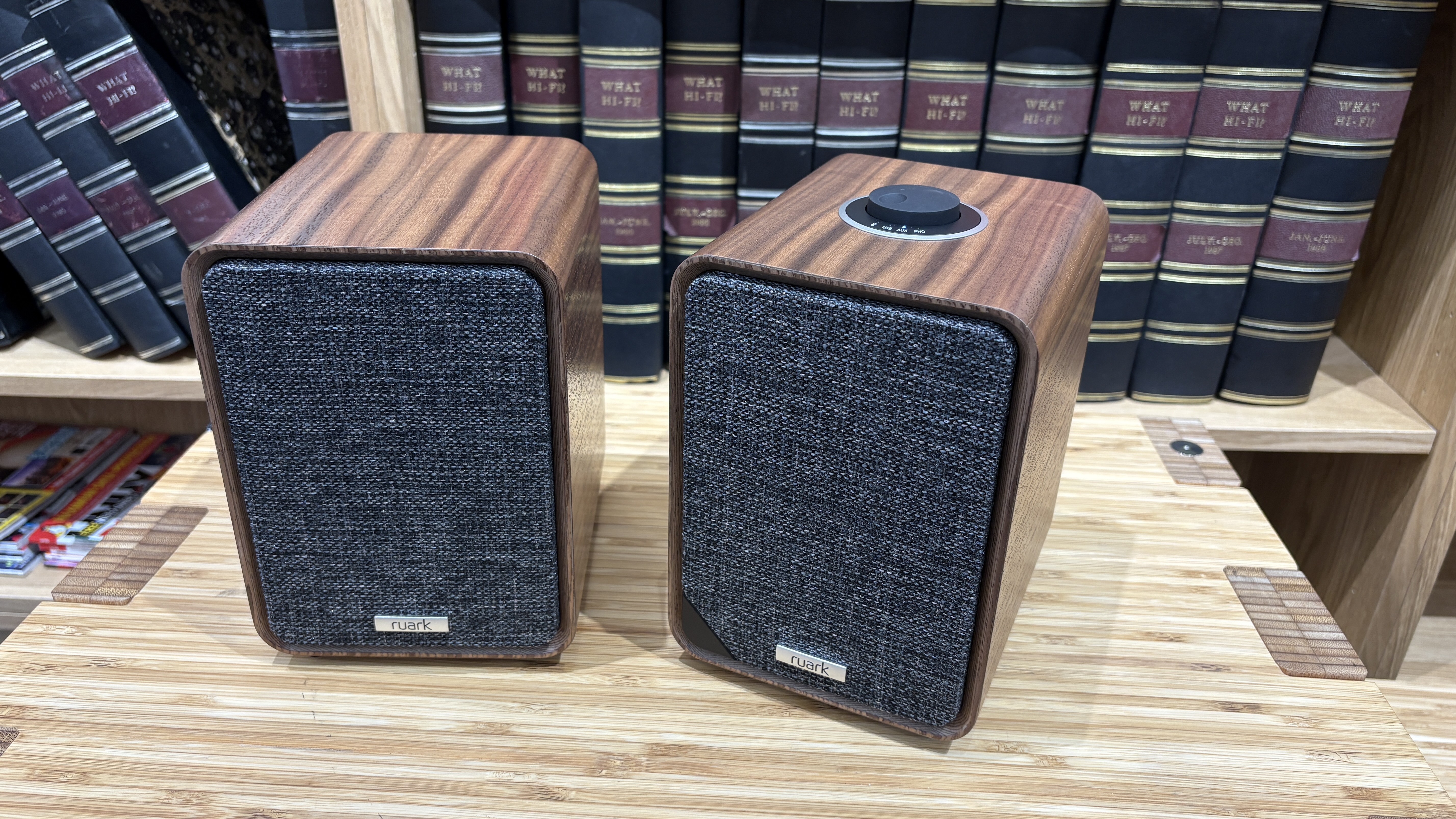 Ruark Audio MR1 Mk3 speakers on wooden rack in test room
