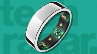 Oura smart ring on turquoise background