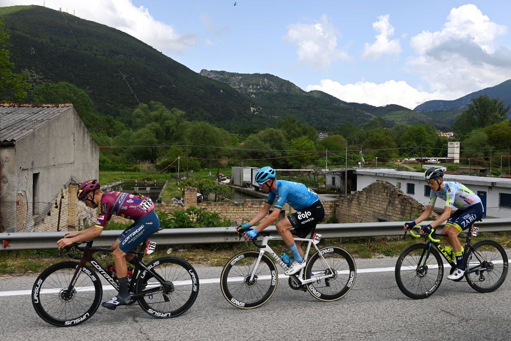 GRAN SASSO DITALIA CAMPO IMPERATORE ITALY MAY 12 LR Karel Vacek of Czech Republic and Team Corratec Selle Italia Davide Bais of Italy and Team EOLOKometa and Simone Petilli of Italy and Team Intermarch Circus Wanty compete in the breakaway during the 106th Giro dItalia 2023 Stage 7 a 218km stage from Capua to Gran Sasso dItalia Campo Imperatore 2123m UCIWT on May 12 2023 in Gran Sasso dItalia Campo Imperatore Italy Photo by Tim de WaeleGetty Images