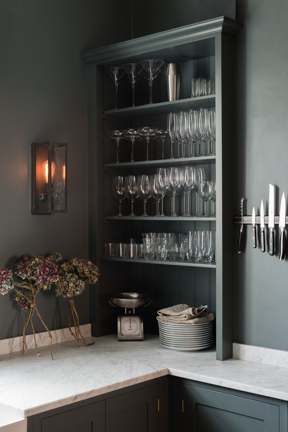 kitchen storage hacks with slim shelving by deVOL