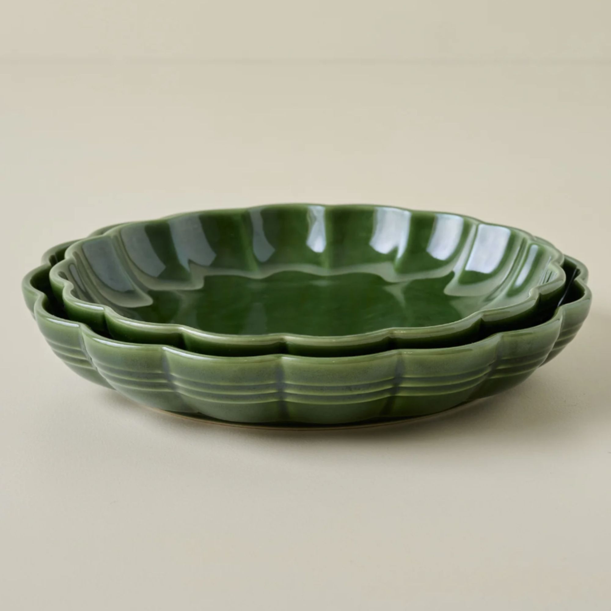 Set of two forest green scalloped pie dishes