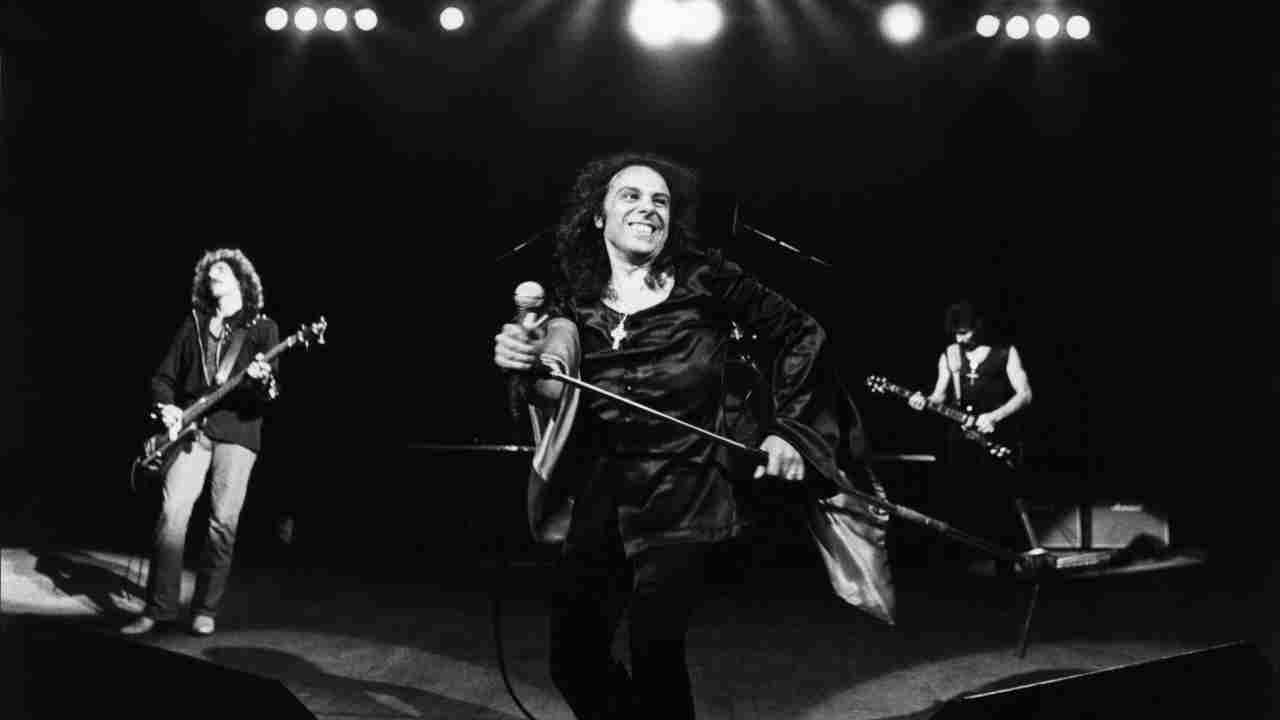 Black Sabbath performing onstage in the early 1980s