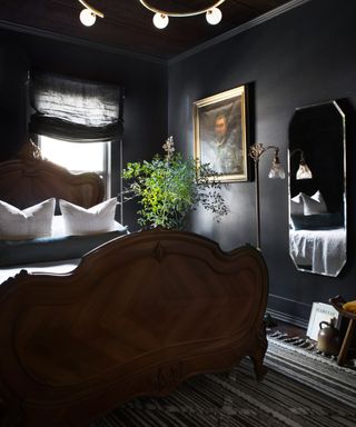 Dark bedroom painted in Benjamin Moore