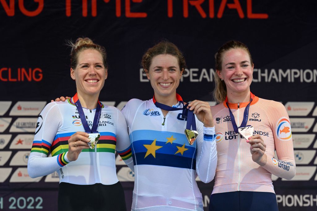 L to R Netherlands silvermedallist Ellen Van Dijk Switzerlands goldmedallist Marlen Reusser and Netherlands bronzemedallist Reijanne Markus pose on the podium after the Womens Individual time trial during the European Championships Munich 2022 in Munich southern Germany on August 17 2022 Photo by CHRISTOF STACHE AFP Photo by CHRISTOF STACHEAFP via Getty Images