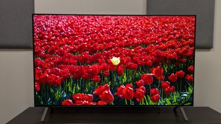 LG B5 OLED TV with red flowers in a field on screen 